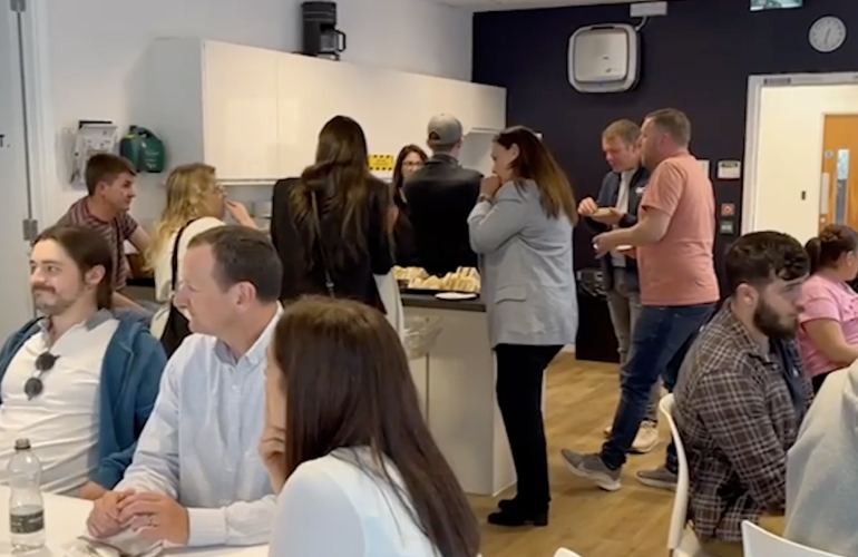 A C I Team members having a team lunch